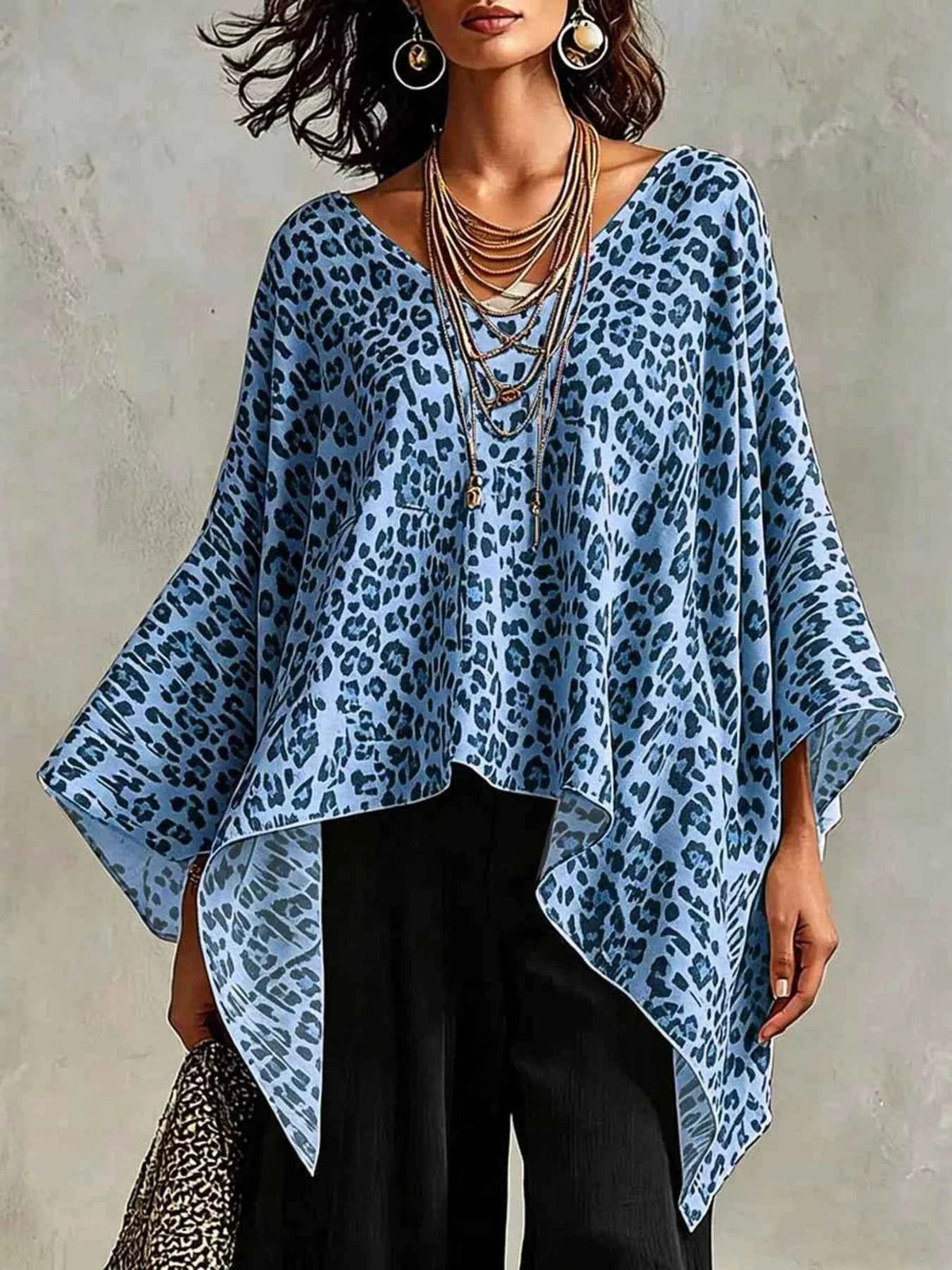 Full Size Leopard Print Asymmetrical Hem Top Plus Size