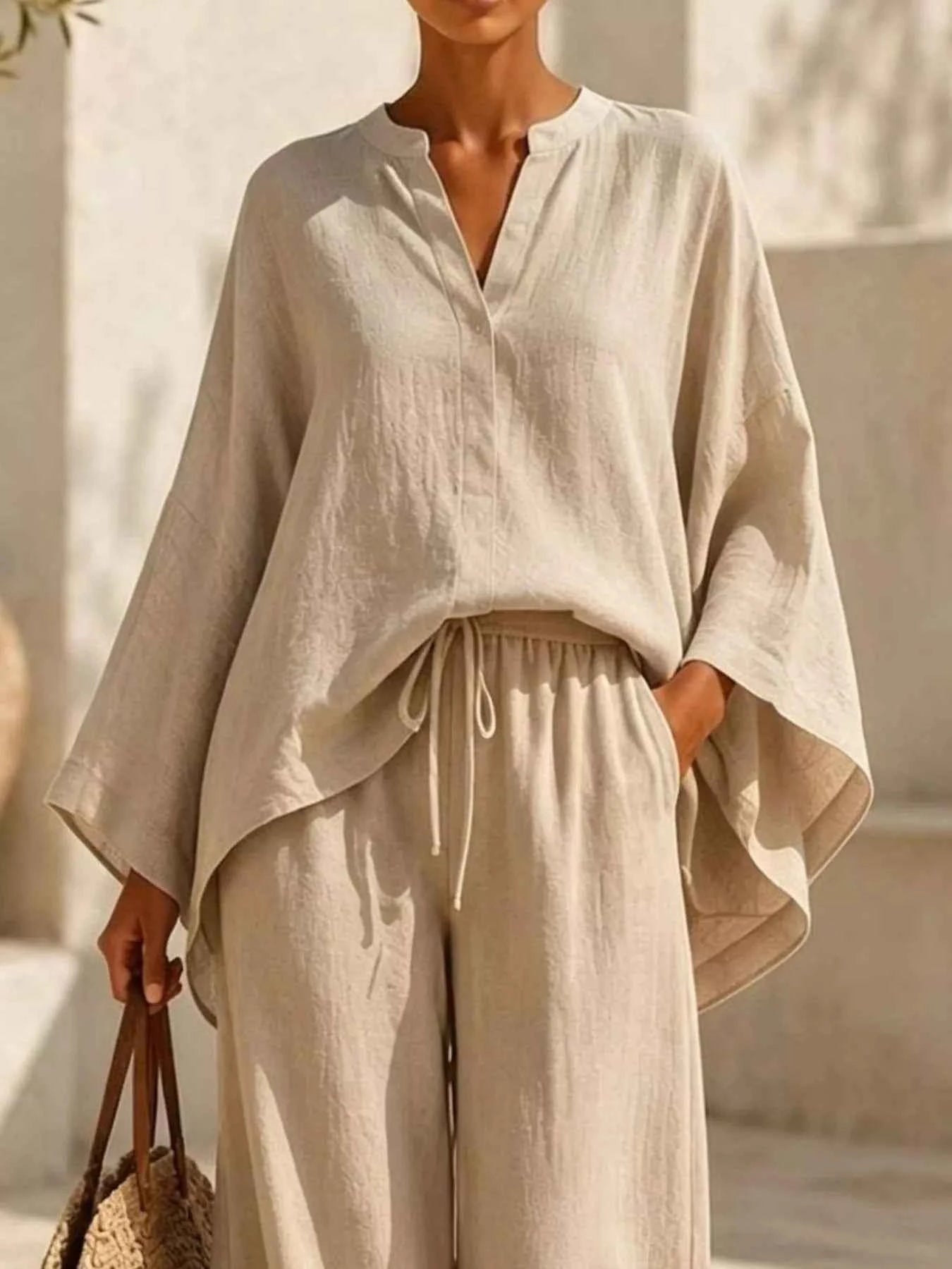 Full Size Notched Long Sleeve Top and Wide-Leg Pants Set Plus Size