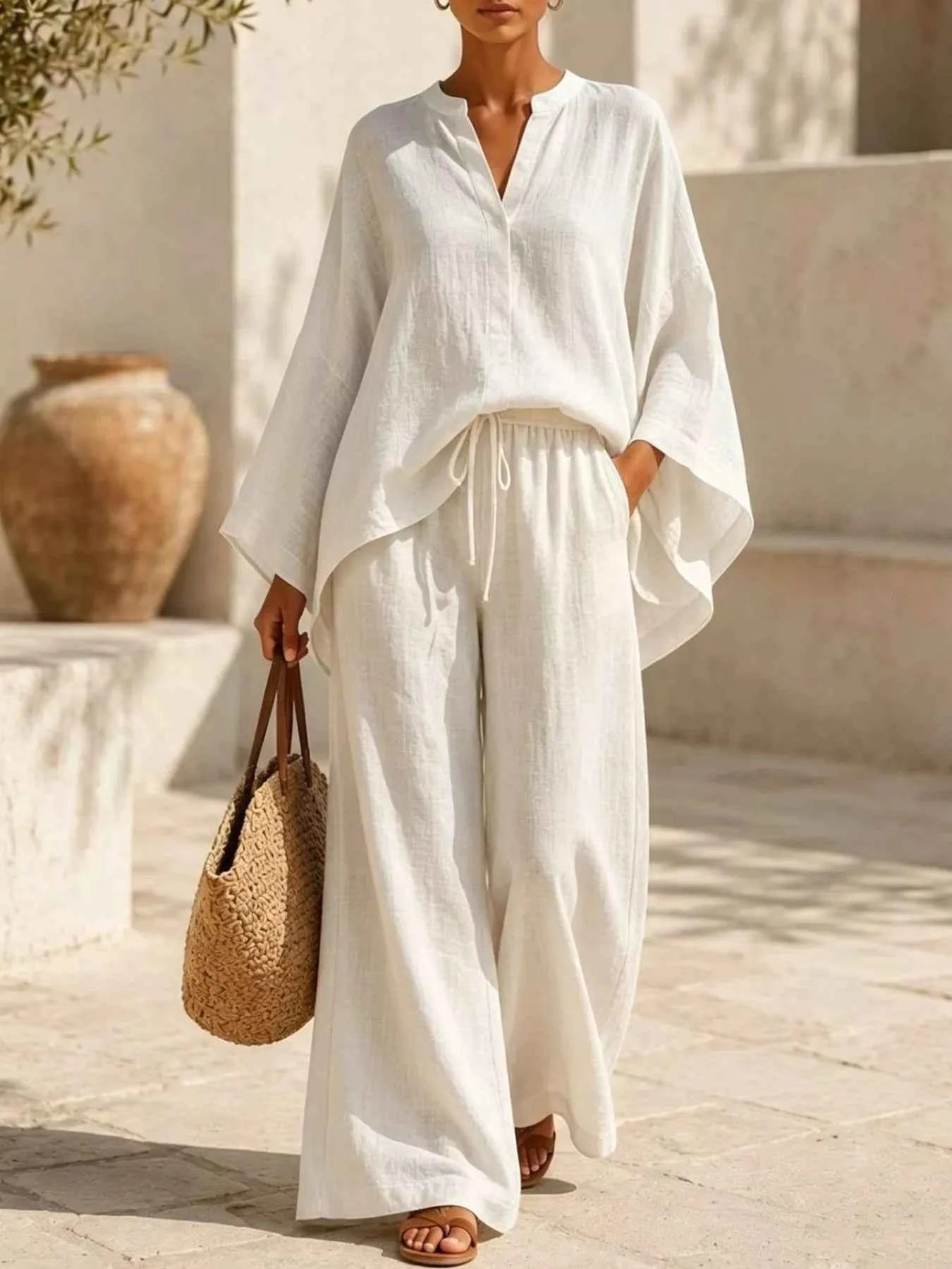 Full Size Notched Long Sleeve Top and Wide-Leg Pants Set Plus Size